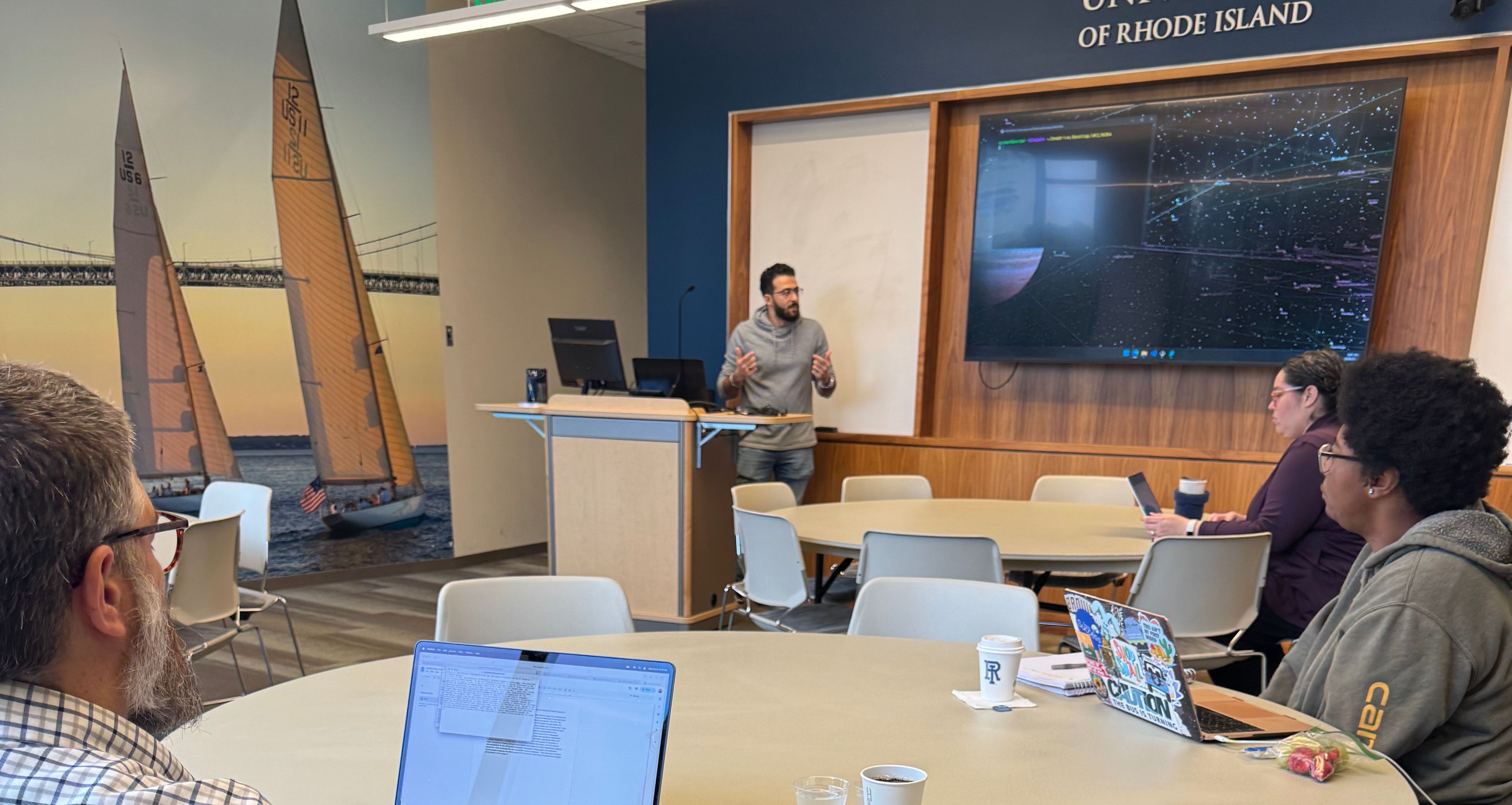 Ayman's speaking at a workshop