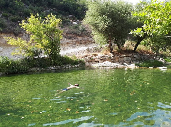 Ayman's floating in a lake